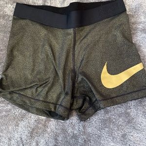 Gold nike pros